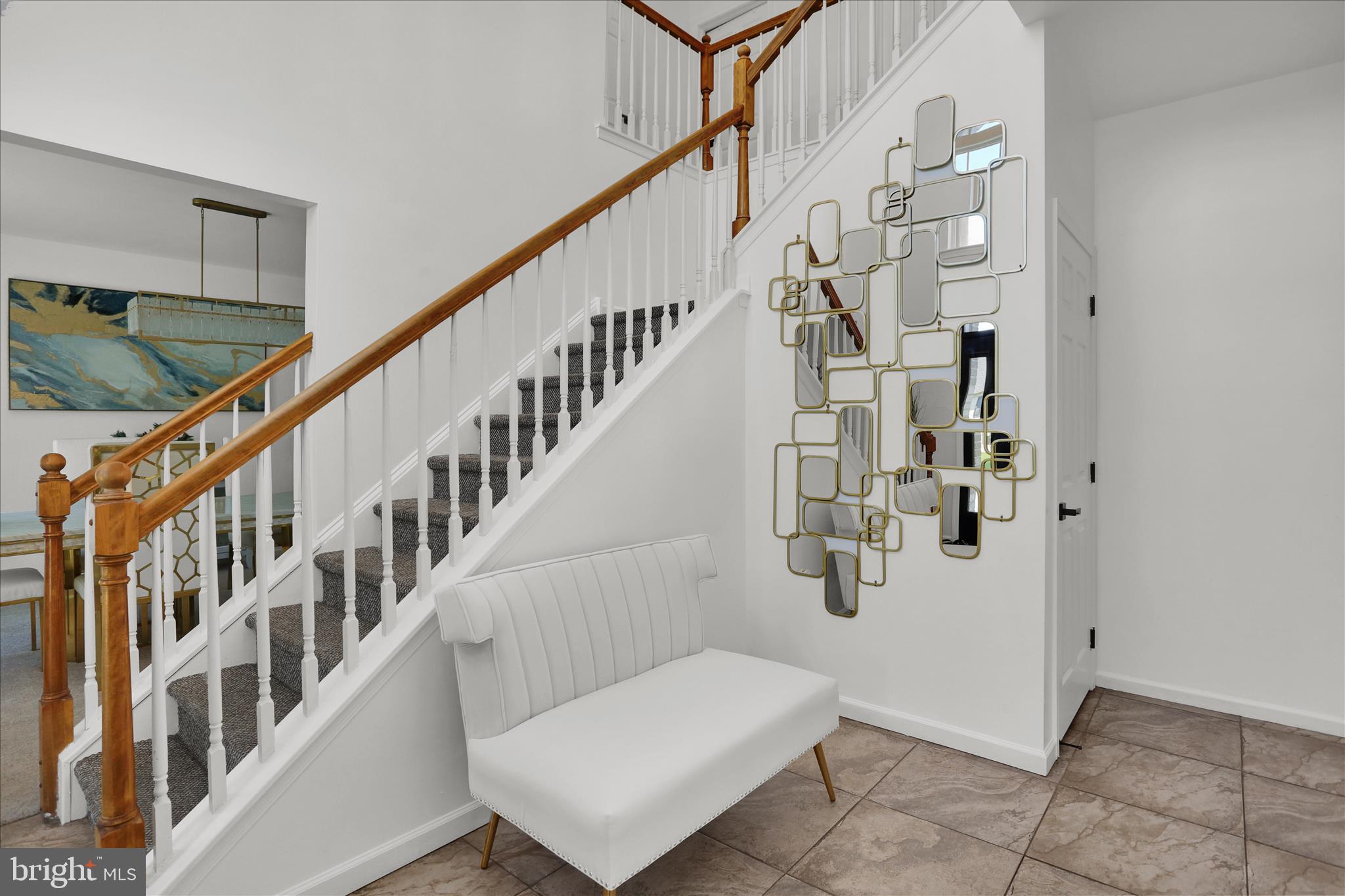 36 Hayden Circle Reading, PA 19606 - Photo 7 of 41 a view of staircase with lots of frames on wall and stairs