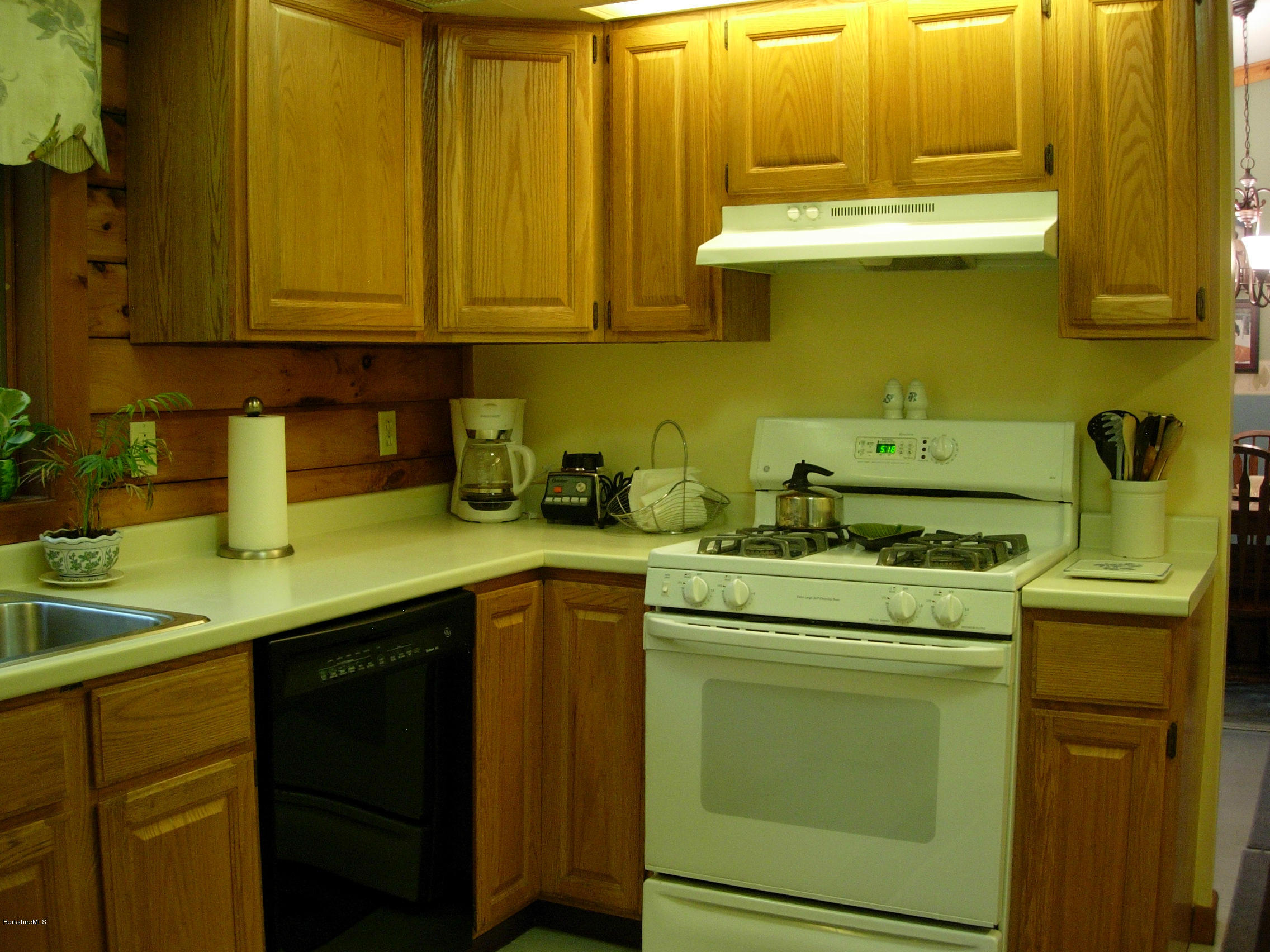 99 Strykers Road Florida, MA 01247 - Photo 2 of 26 a kitchen with a sink and cabinets