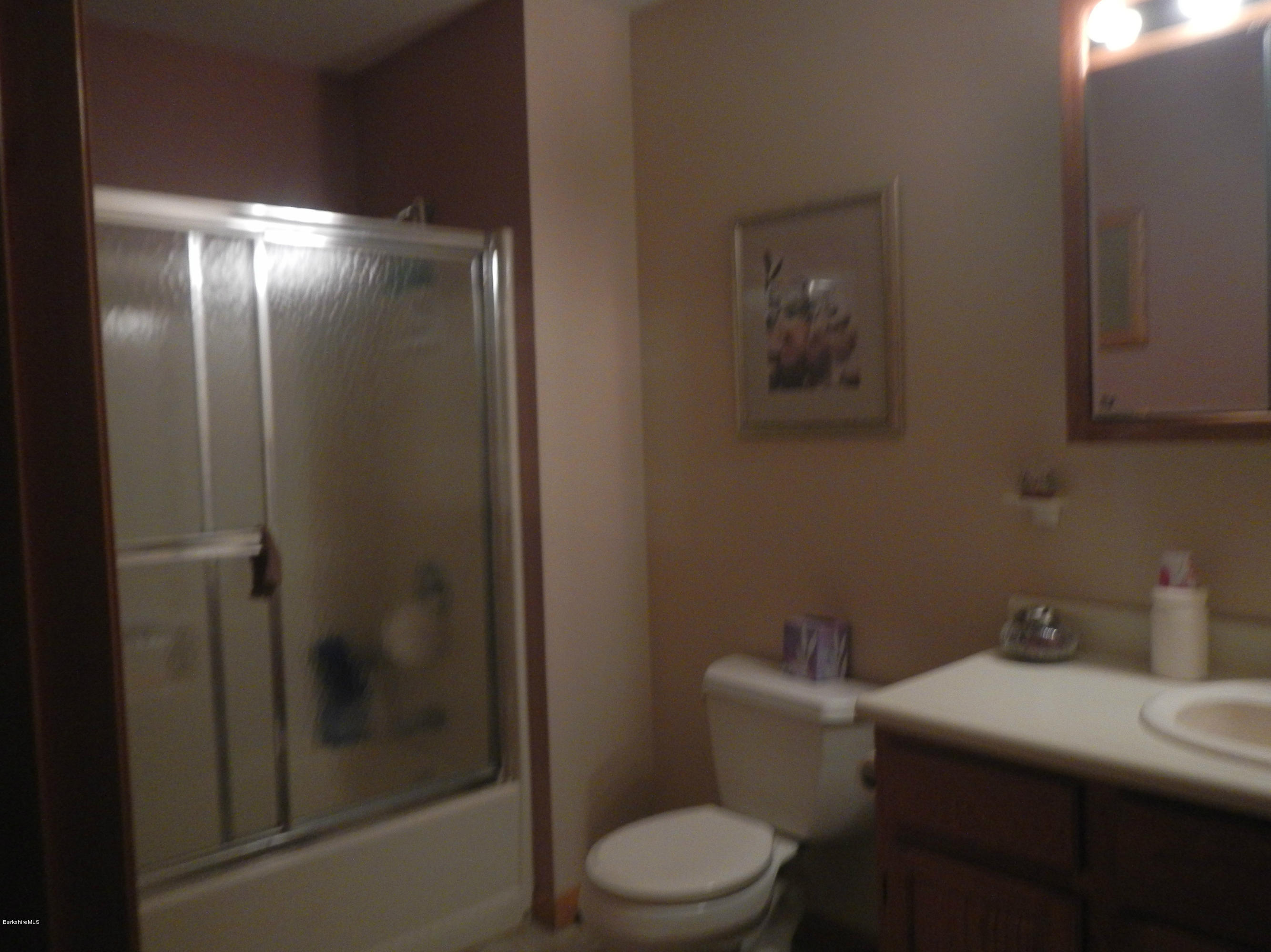 99 Strykers Road Florida, MA 01247 - Photo 20 of 26 a bathroom with a toilet and a sink