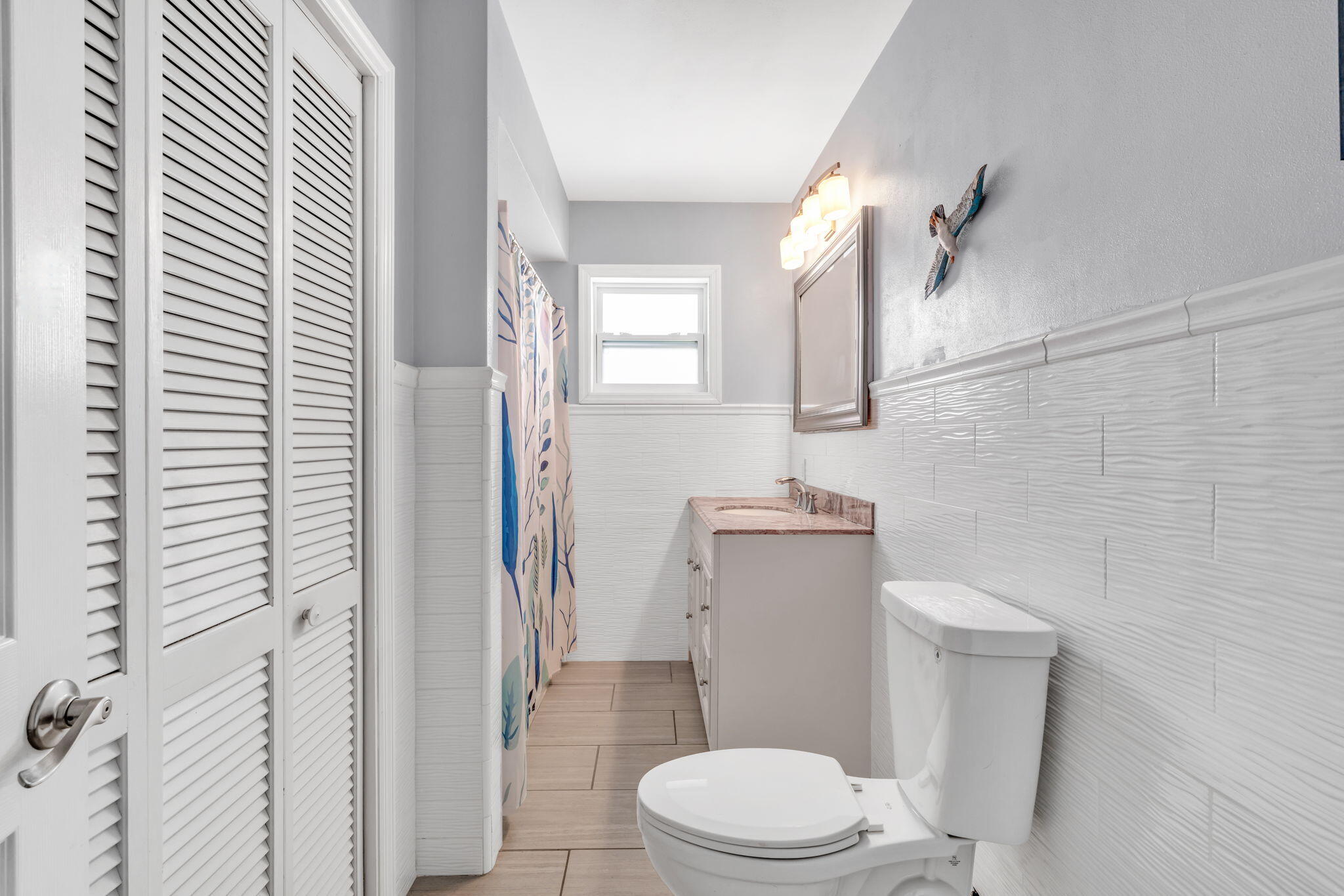30366 Falcon Lane Big Pine Key, FL 33043 - Photo 23 of 45 a white toilet sitting next to a bathroom sink