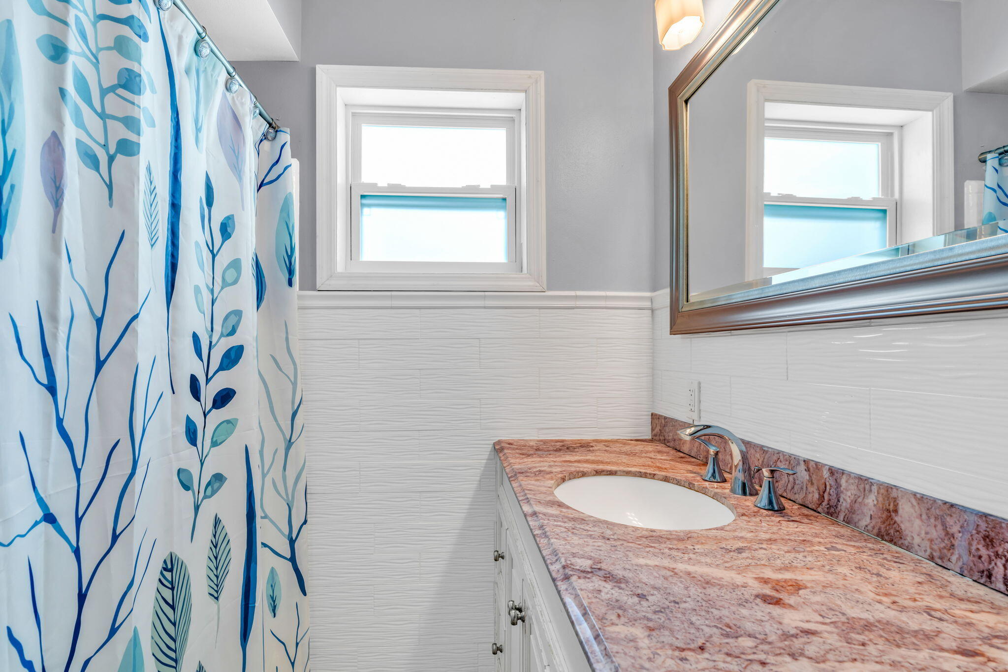 30366 Falcon Lane Big Pine Key, FL 33043 - Photo 24 of 45 a bathroom with a sink and a mirror
