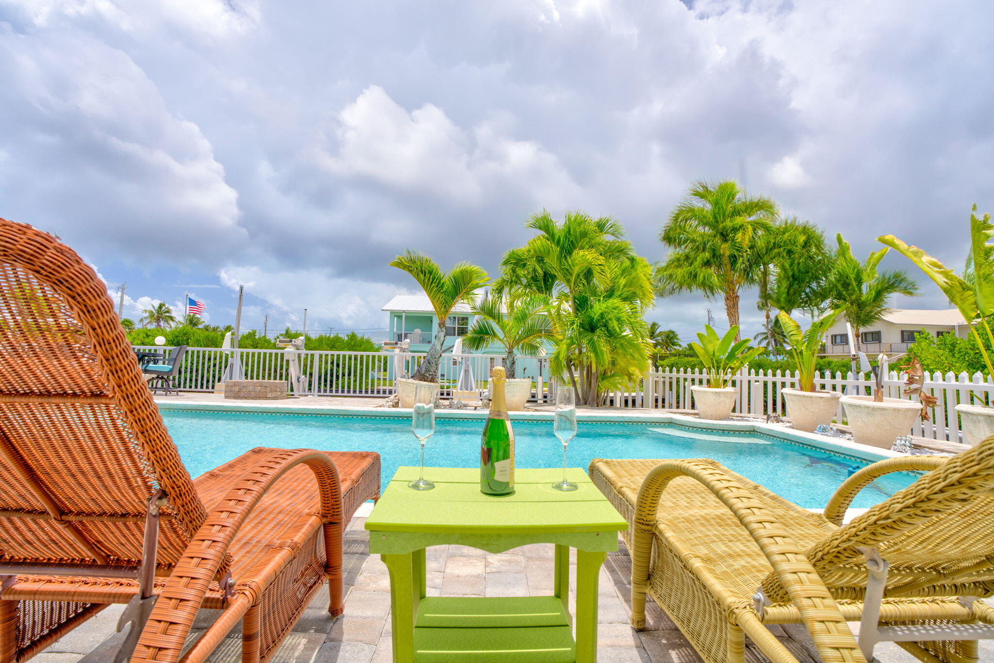 30366 Falcon Lane Big Pine Key, FL 33043 - Photo 26 of 45 a view of a swimming pool with a patio and a yard