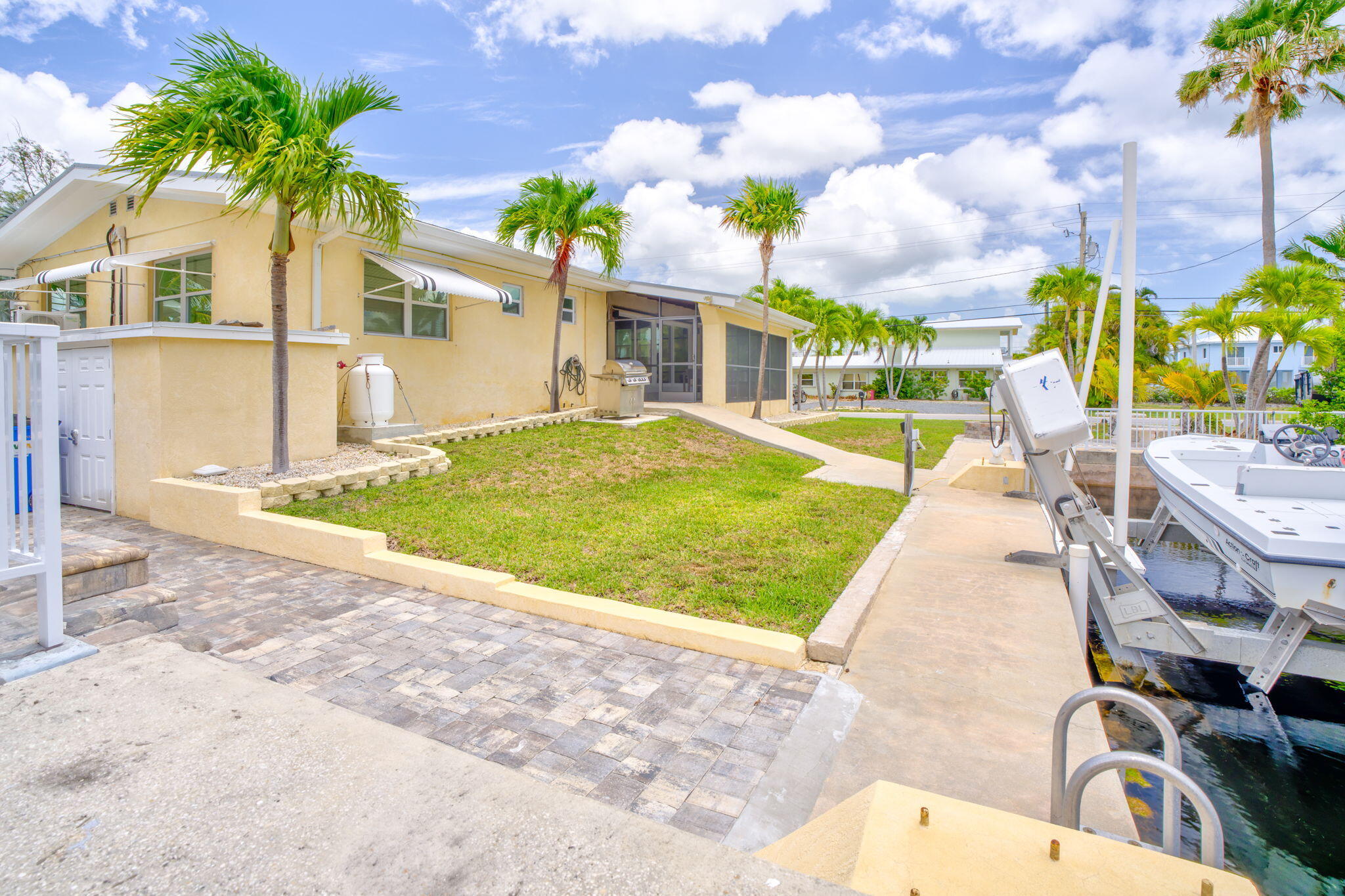 30366 Falcon Lane Big Pine Key, FL 33043 - Photo 29 of 45 a view of a backyard with a garden and plants