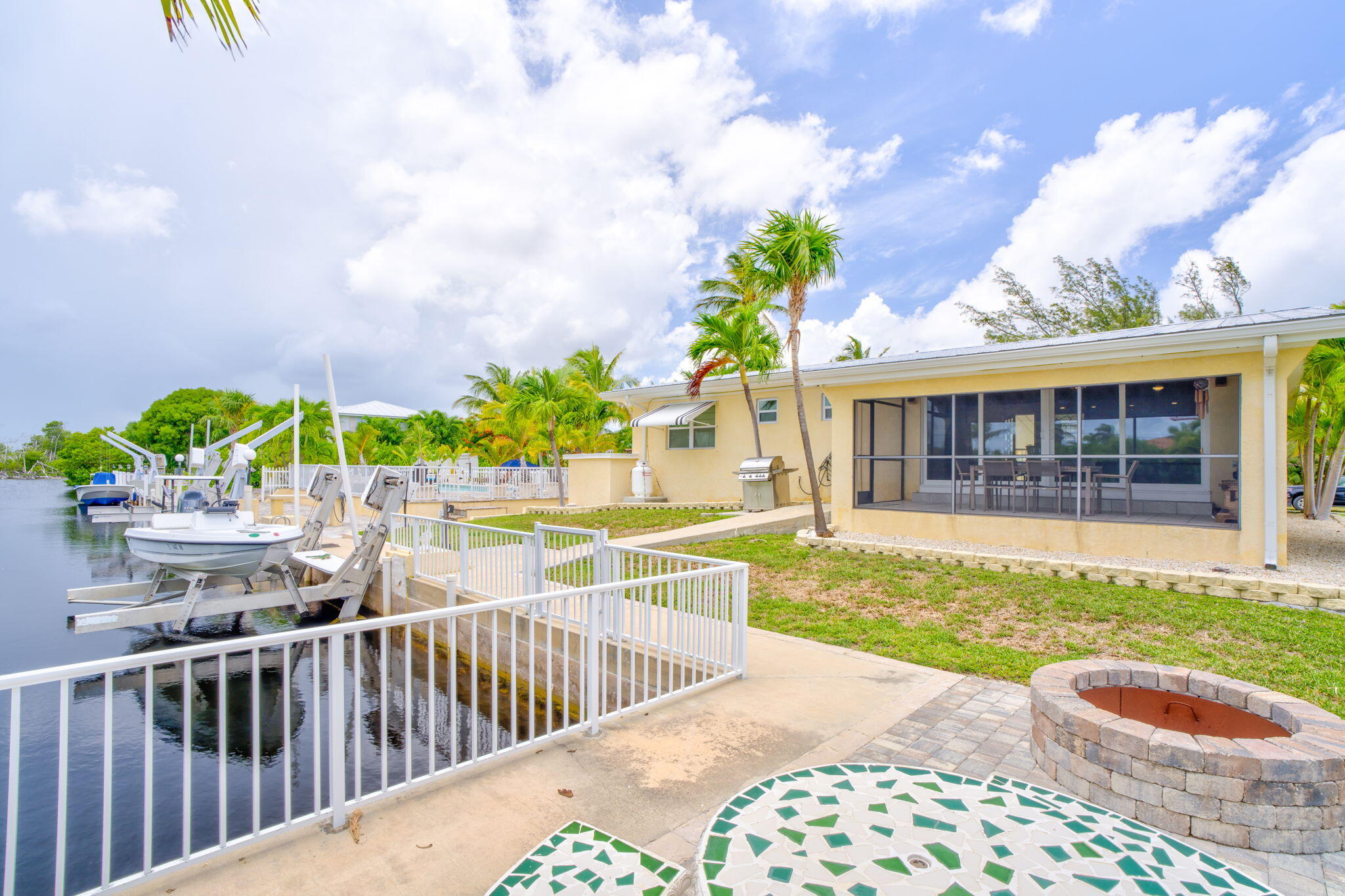 30366 Falcon Lane Big Pine Key, FL 33043 - Photo 31 of 45 a view of a house with backyard and sitting area