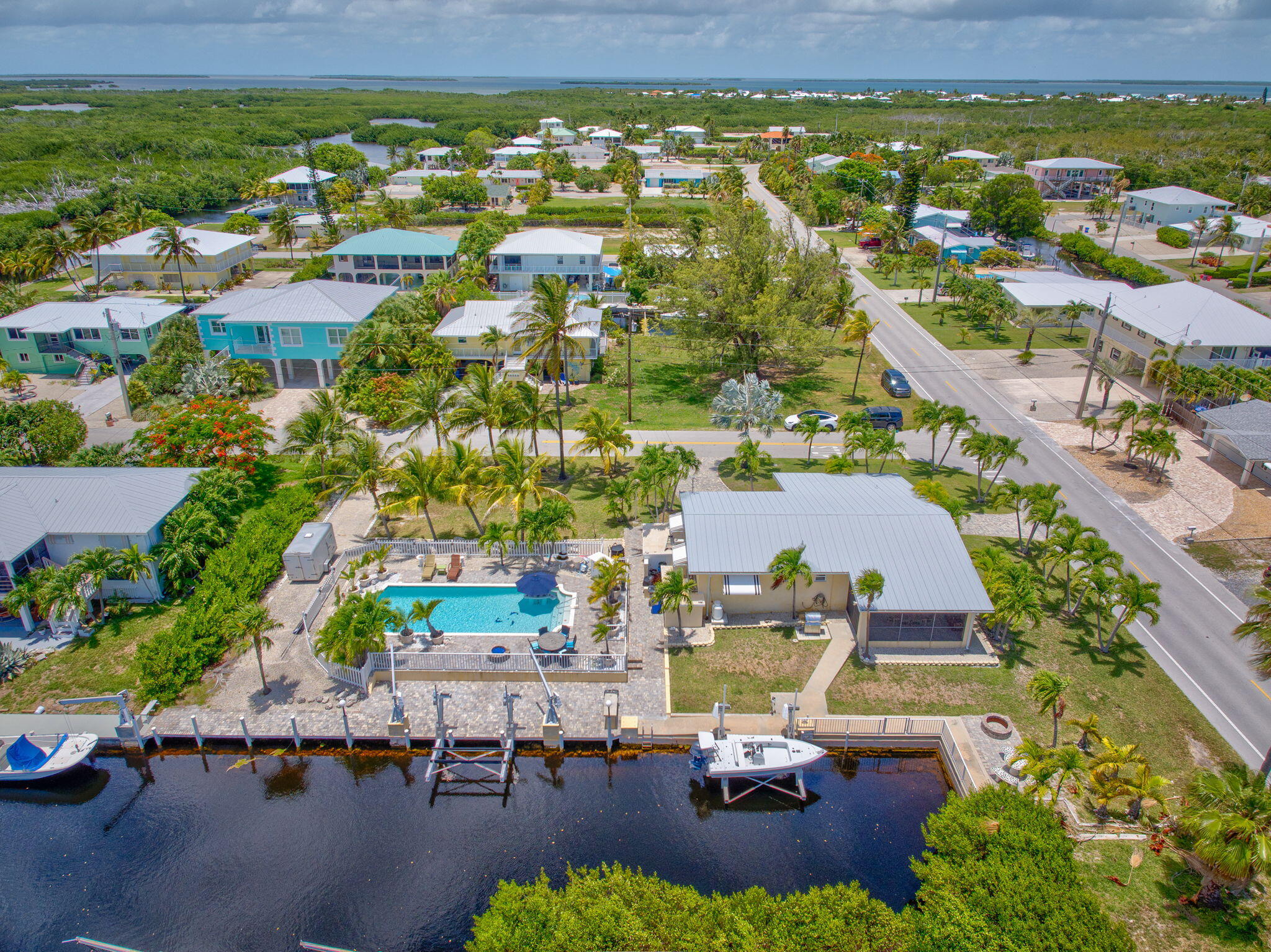 30366 Falcon Lane Big Pine Key, FL 33043 - Photo 39 of 45 a view of a city with lawn chairs