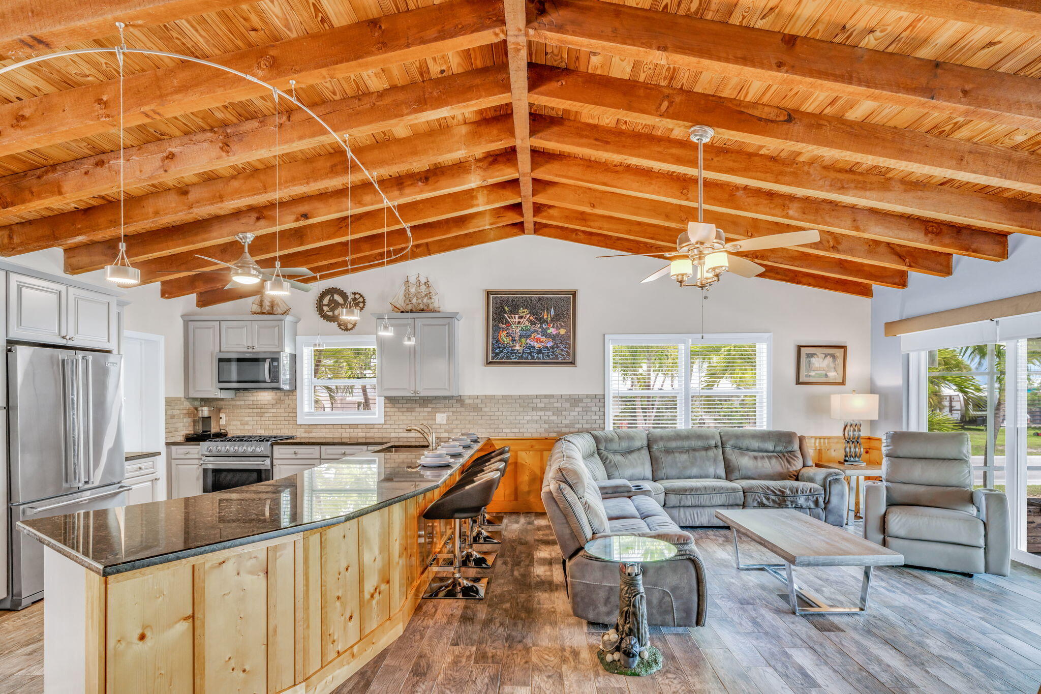 30366 Falcon Lane Big Pine Key, FL 33043 - Photo 5 of 45 a very nice looking room with many windows and furniture