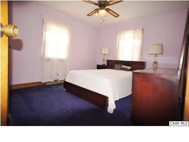 810 Chopping Road Mineral, VA 23117 - Photo 4 of 20 a living room with a bed furniture and a window