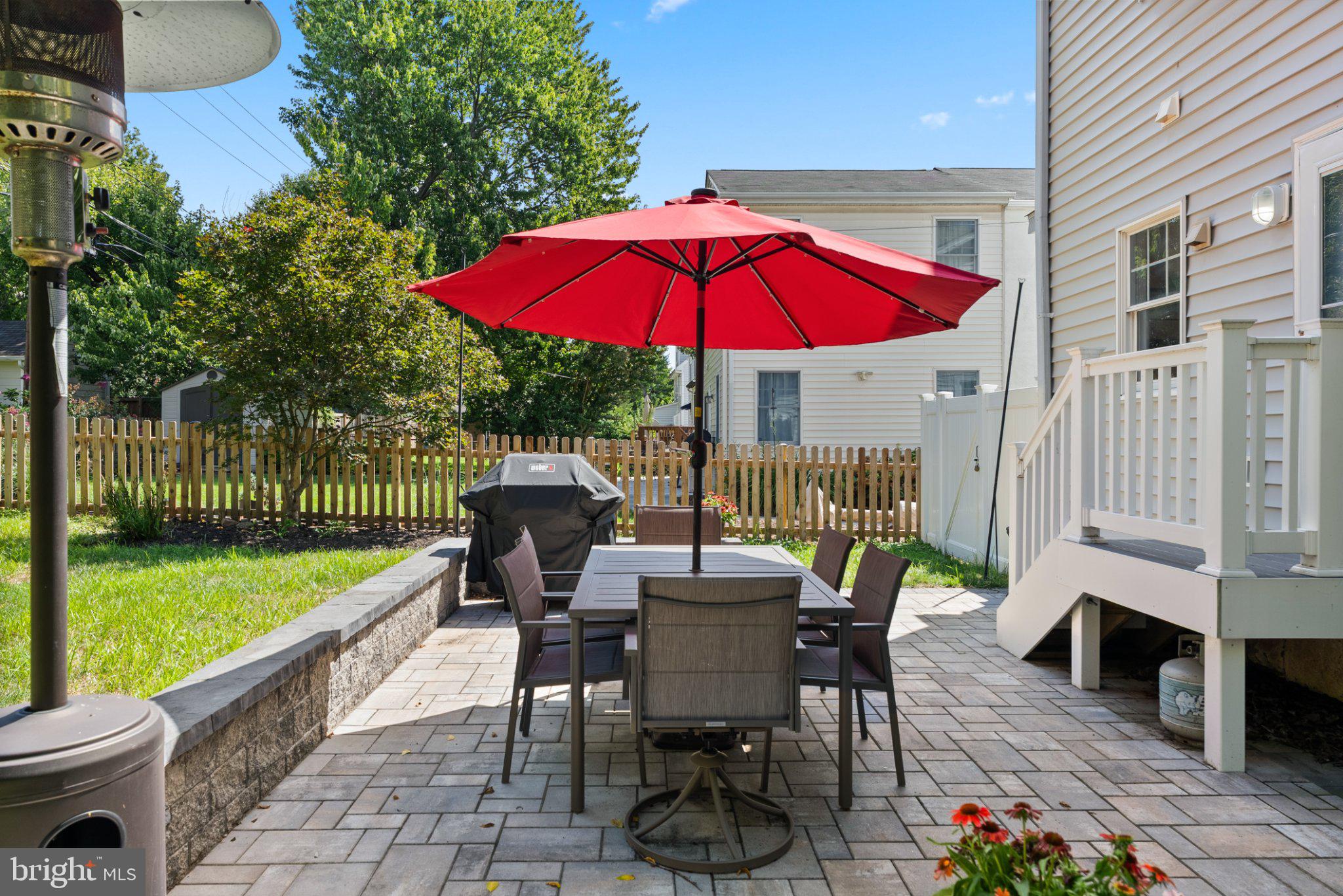 620 Murdock Road Baltimore, MD 21212 - Photo 33 of 41 Sunny patio oasis with vibrant umbrella.