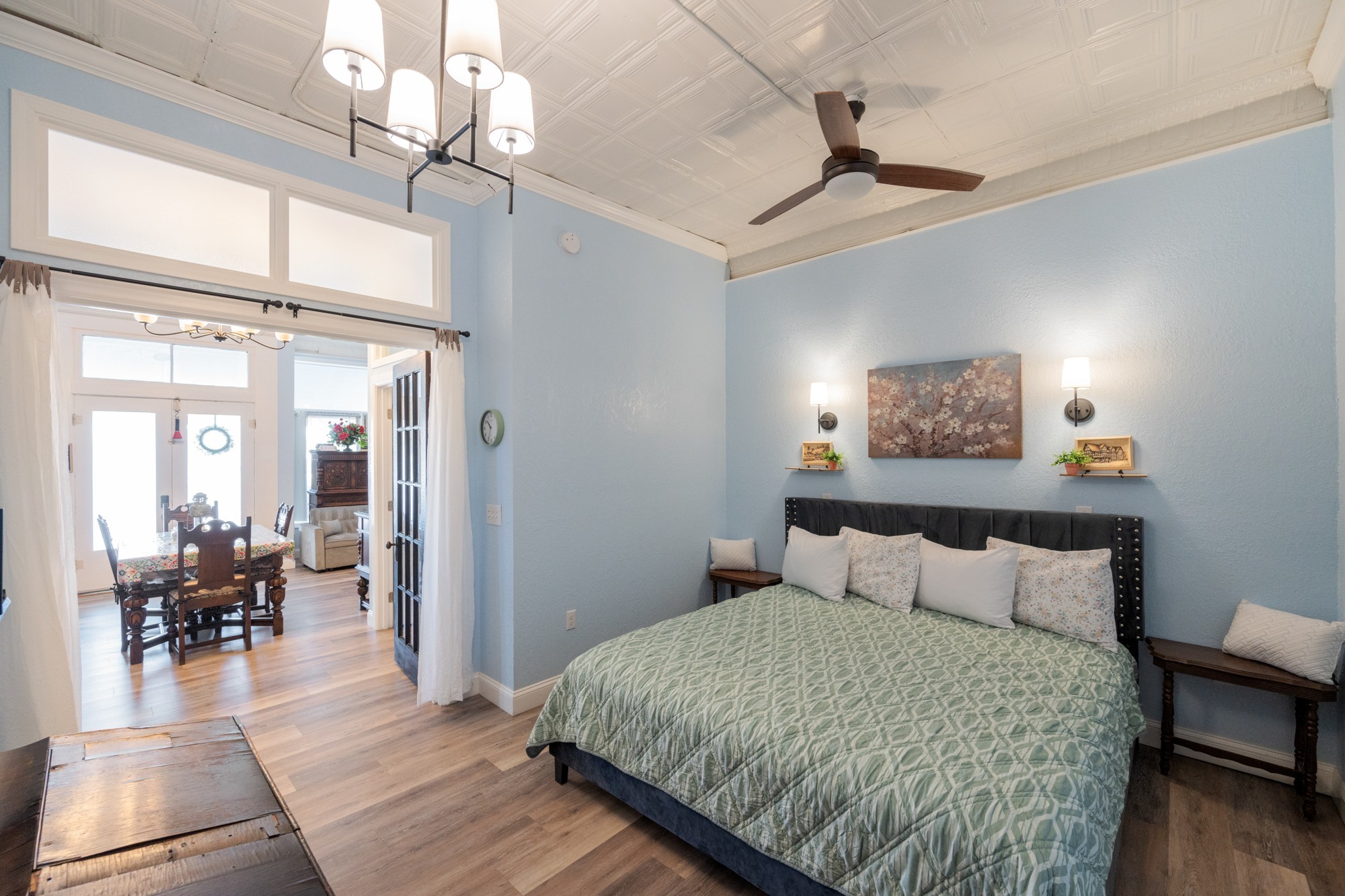 8 East Main Street Decaturville, TN 38329 - Photo 9 of 27 a bedroom with a bed and wooden floor