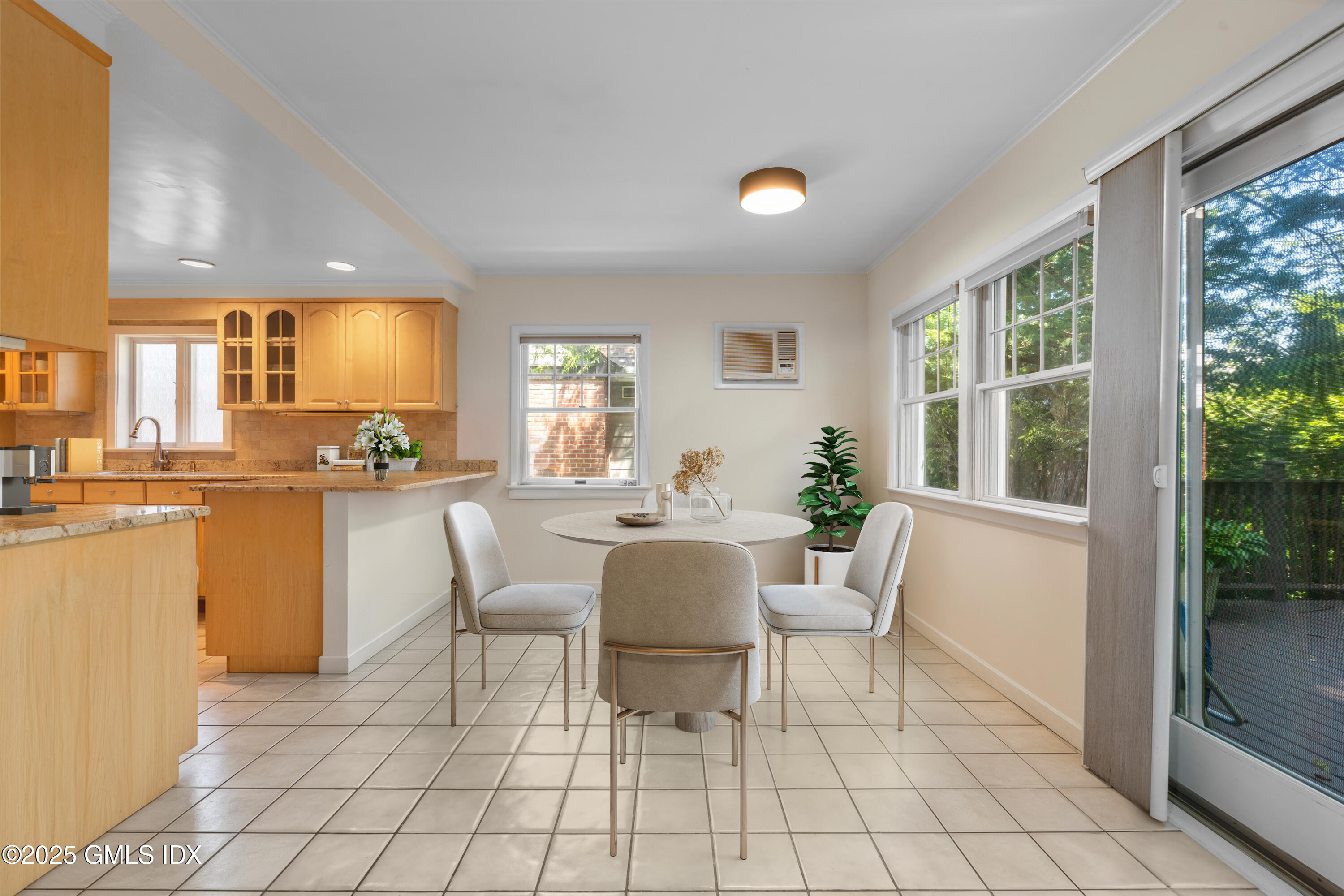 15 Ridge Road Cos Cob, CT 06807 - Photo 6 of 15 a dining room with furniture and large windows