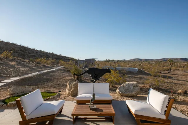 a view of a terrace with chairs