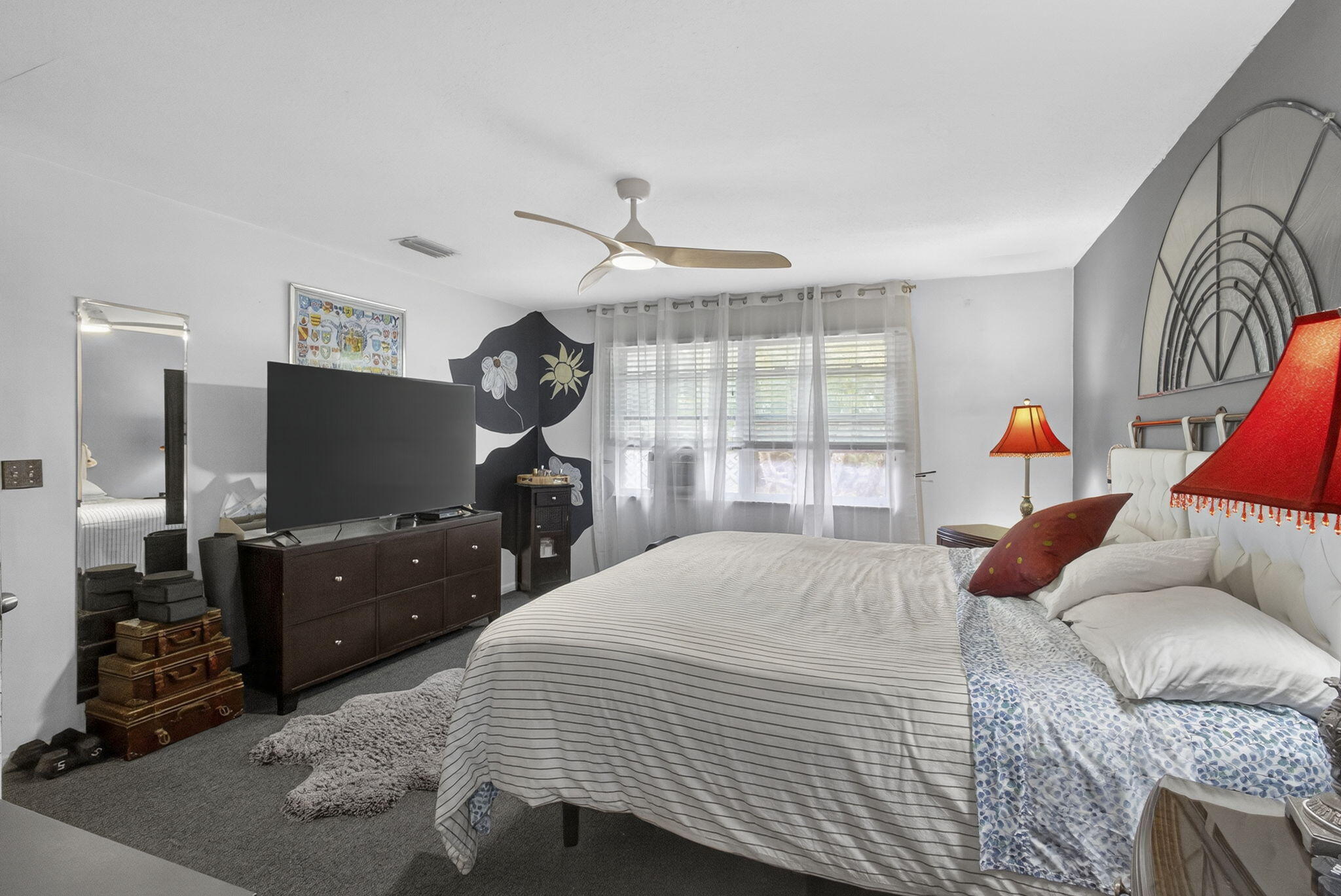 15773 85th Road North Loxahatchee, FL 33470 - Photo 27 of 75 a bedroom with a bed and wooden floor