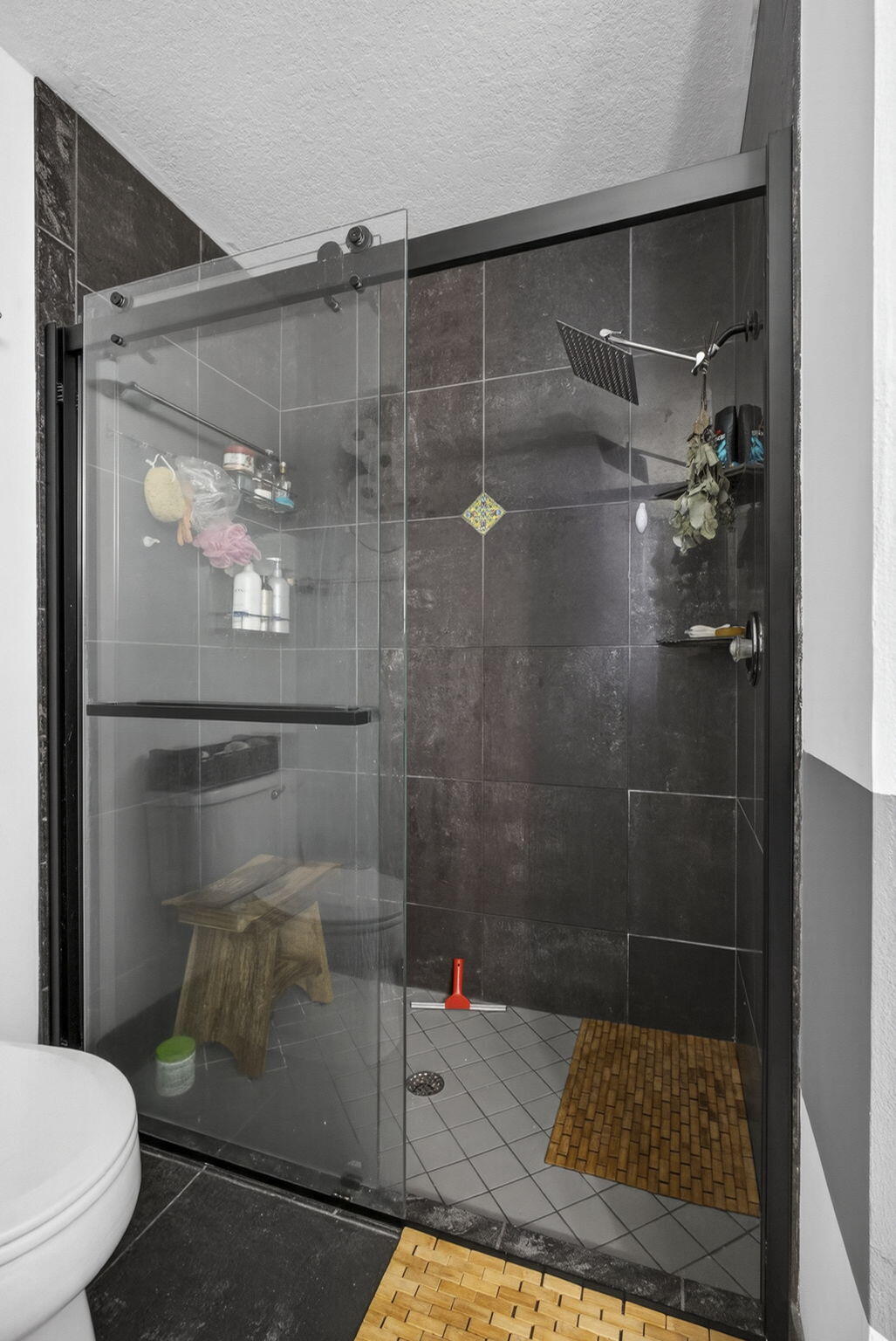 15773 85th Road North Loxahatchee, FL 33470 - Photo 31 of 75 a bathroom with a shower and a toilet