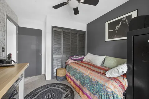 a front view of a house with outdoor seating