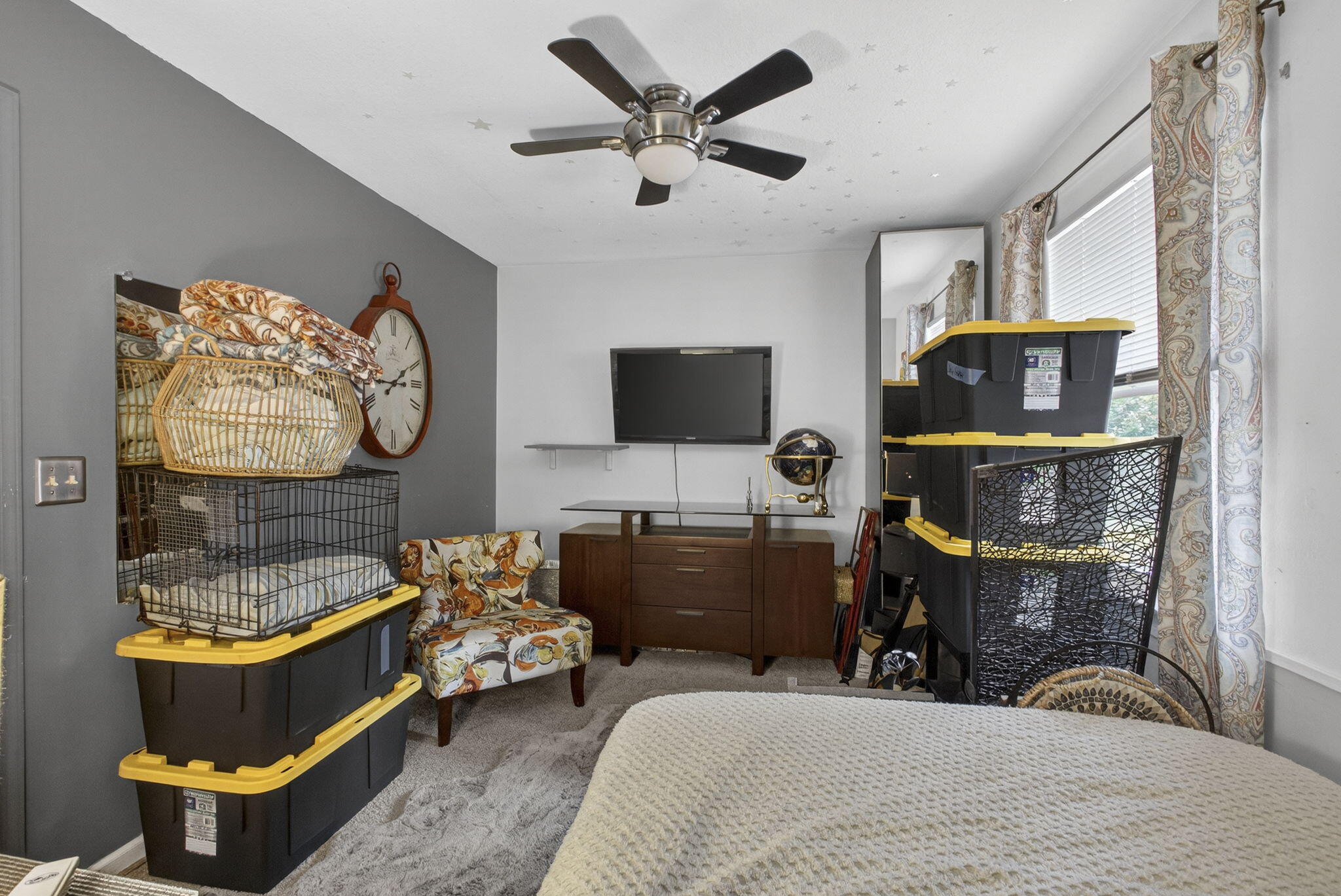 15773 85th Road North Loxahatchee, FL 33470 - Photo 37 of 75 a bedroom with furniture and a flat screen tv