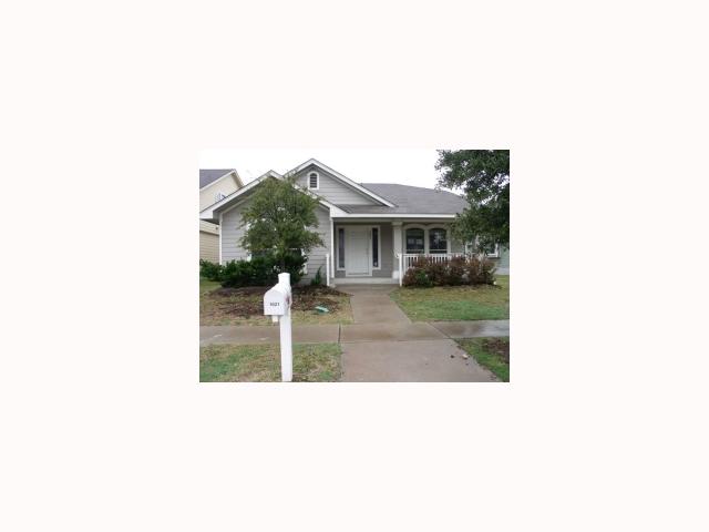 a black and white photo of a house