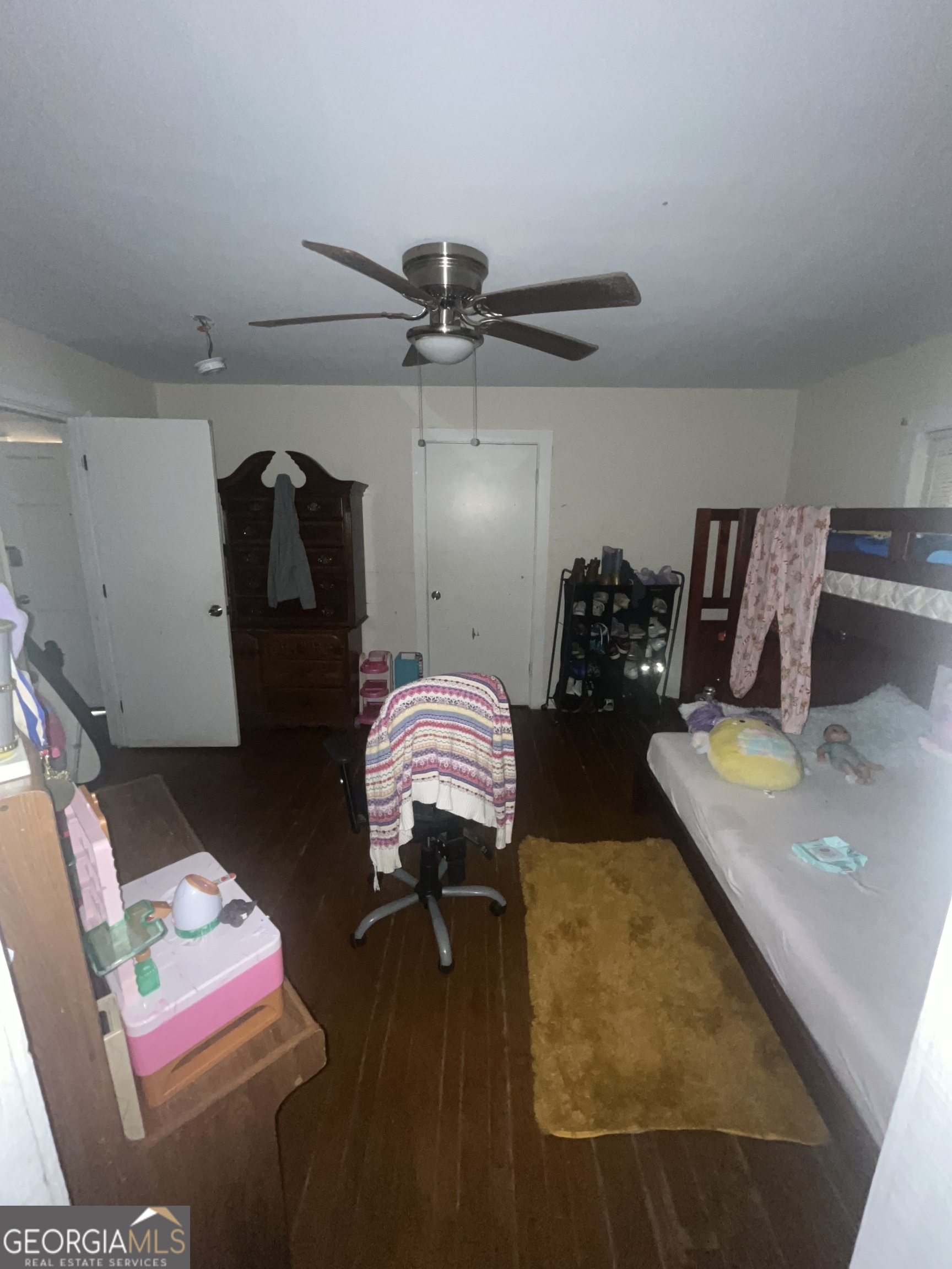 1621 Lee Street Brunswick, GA 31520 - Photo 14 of 14 a bedroom with two beds and a desk