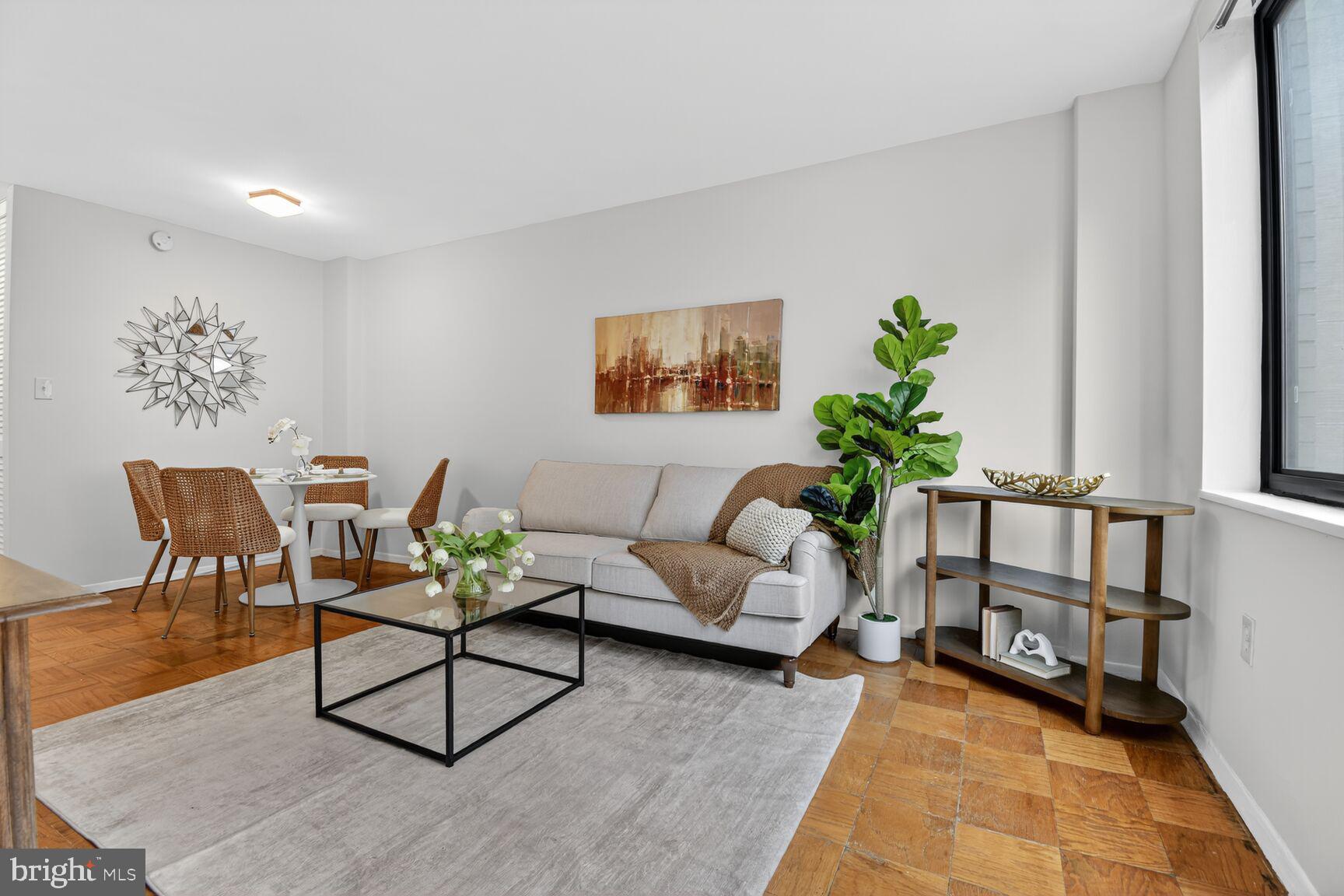 2030 F Street Northwest, Unit 411 Washington, DC 20006 - Photo 14 of 22 a living room with furniture