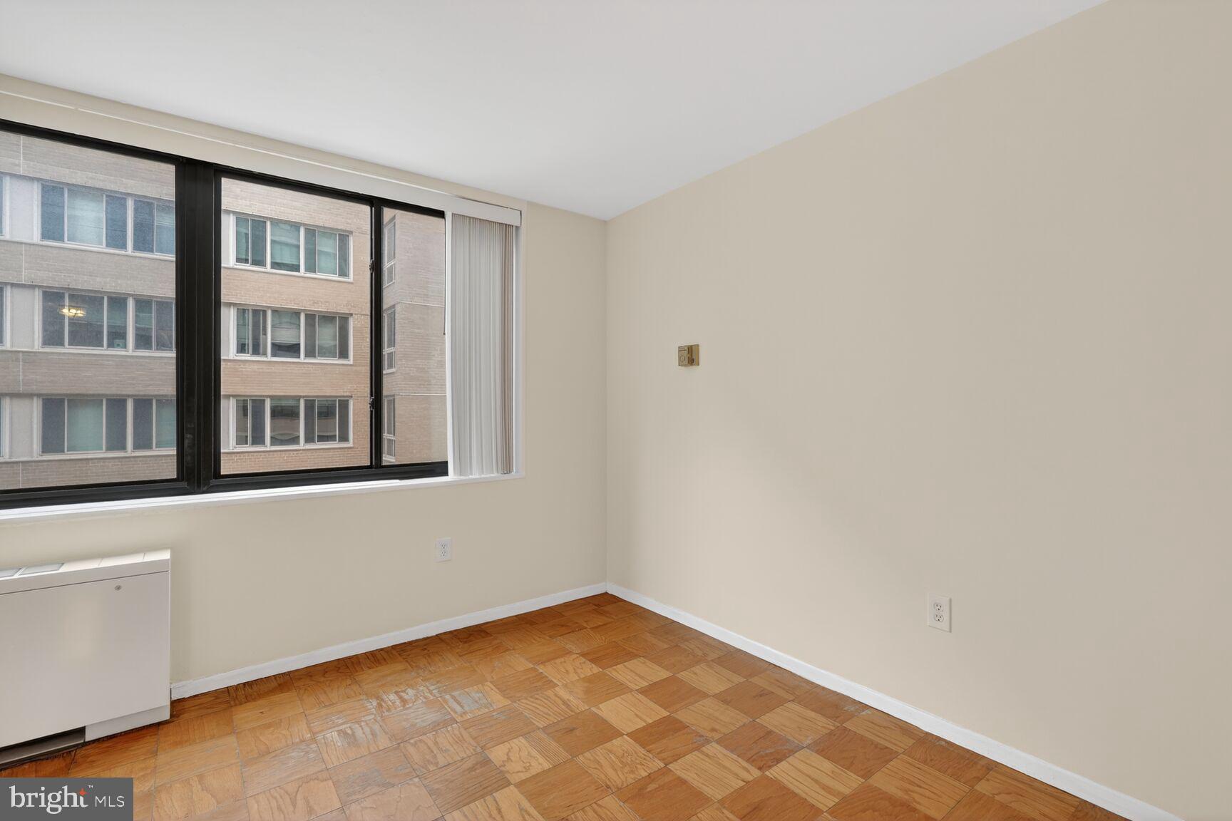 2030 F Street Northwest, Unit 411 Washington, DC 20006 - Photo 15 of 20 a view of an empty room with a window