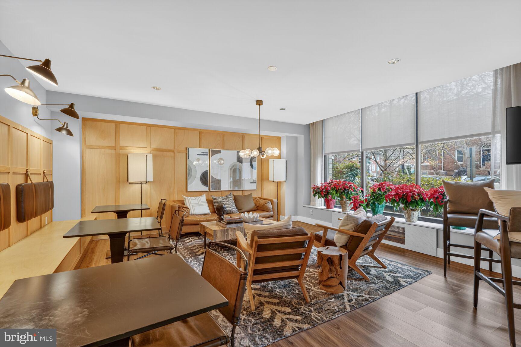 2030 F Street Northwest, Unit 411 Washington, DC 20006 - Photo 18 of 20 a living room with furniture and a large window