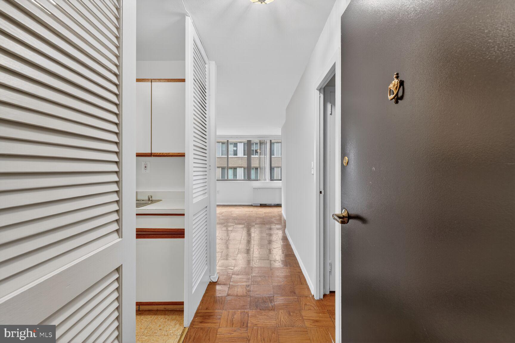 2030 F Street Northwest, Unit 411 Washington, DC 20006 - Photo 3 of 20 a view of a bathroom from the hallway