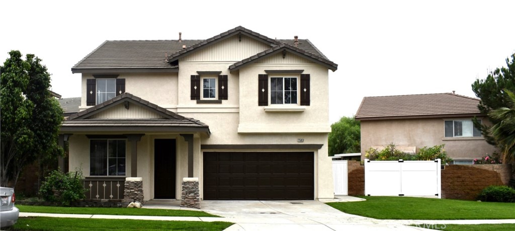 7503 Pinot Place Rancho Cucamonga, CA 91739 - Photo 1 of 1 a front view of a house with a yard