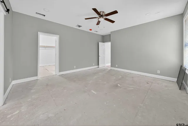 a view of a big room with carpet