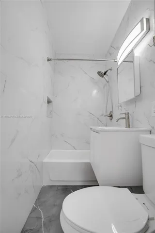 a view of an empty room with sliding door and balcony