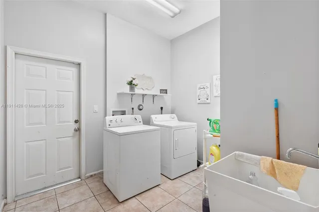 a bedroom with a bed and a table in it