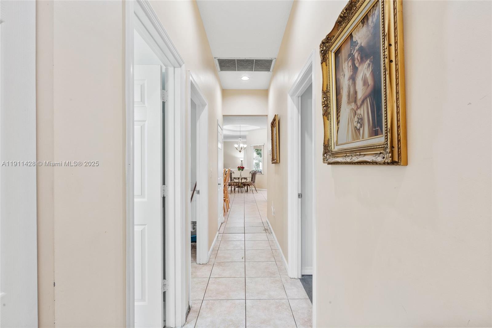 13875 Southwest 41st Street Davie, FL 33330 - Photo 37 of 62 a view of a hallway with wooden floor and staircase
