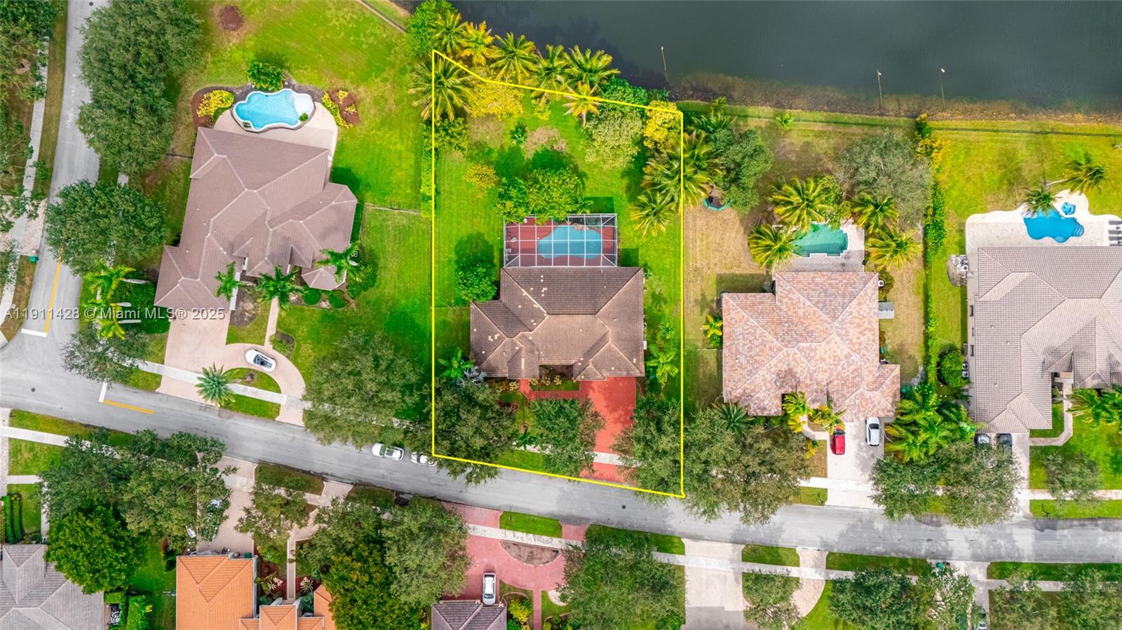 13875 Southwest 41st Street Davie, FL 33330 - Photo 56 of 62 an aerial view of a city with lots of residential buildings ocean and mountain view