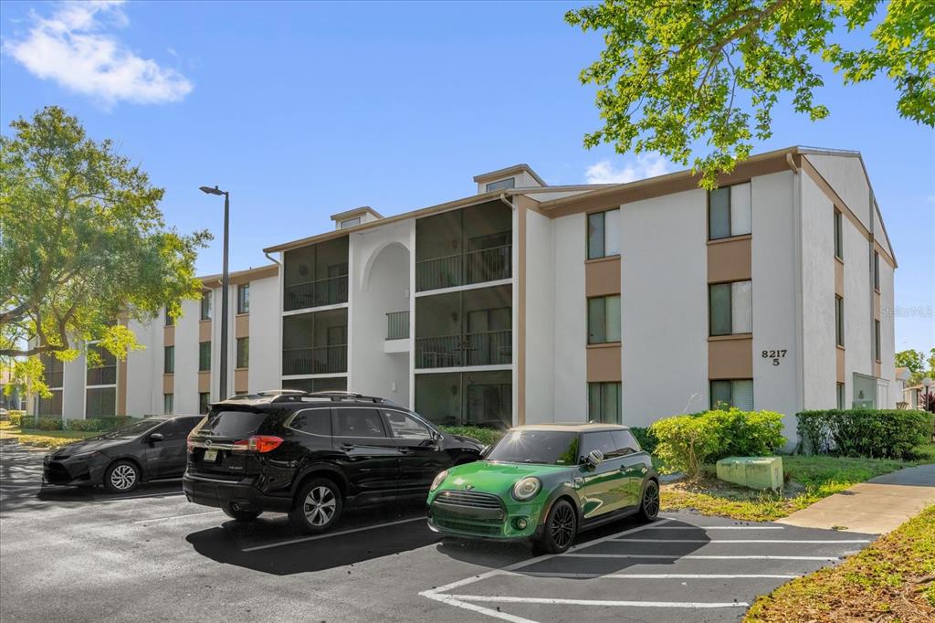 8217 Sun Spring Circle, Unit 41 Orlando, FL 32825 - Photo 1 of 1 a car parked in front of a house