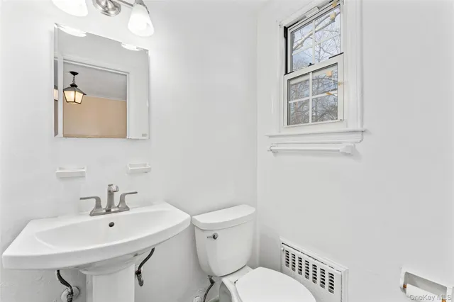a kitchen with a sink and a refrigerator