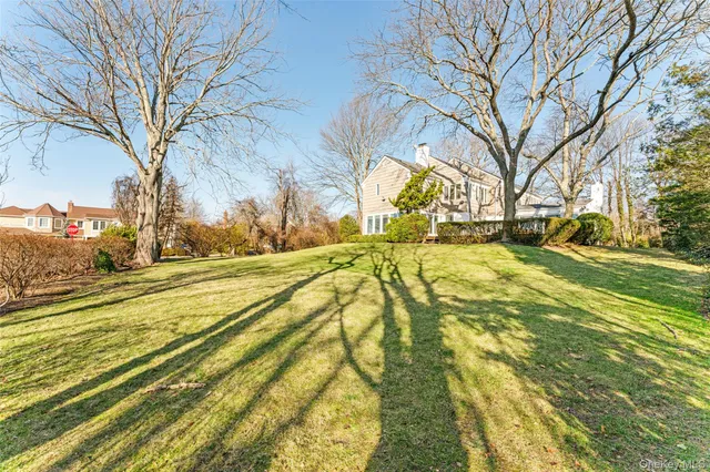 a view of yard with swimming pool