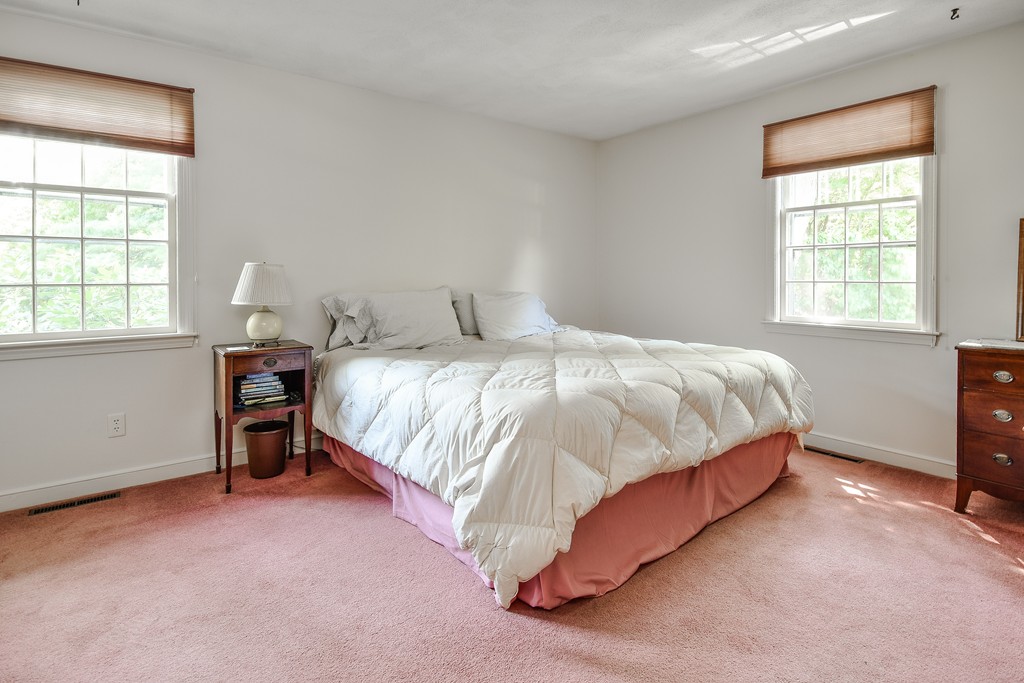 18 Griscom Road Sudbury, MA 01776 - Photo 11 of 29 a bedroom with a bed and window