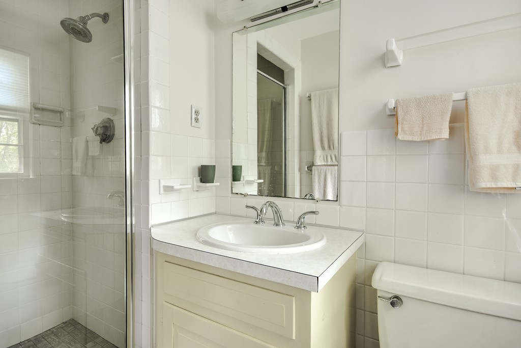 18 Griscom Road Sudbury, MA 01776 - Photo 12 of 29 a bathroom with a sink toilet and shower
