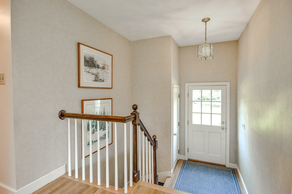 18 Griscom Road Sudbury, MA 01776 - Photo 15 of 29 a view of a hallway with windows and entryway
