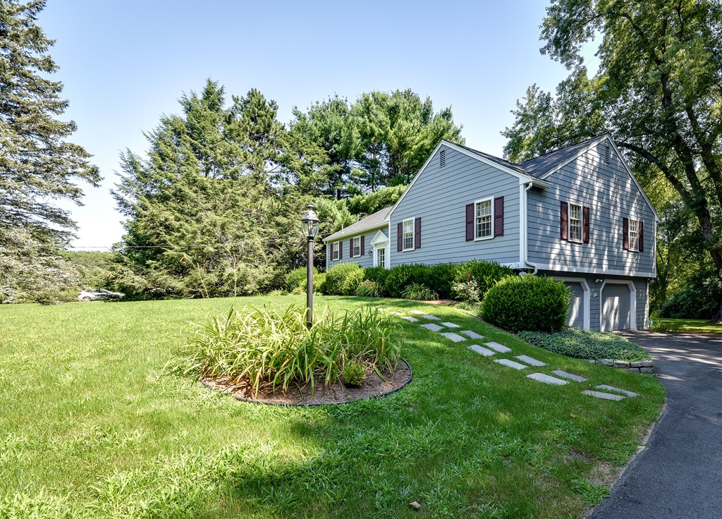 18 Griscom Road Sudbury, MA 01776 - Photo 26 of 29 a view of a house with a big yard plants and large trees