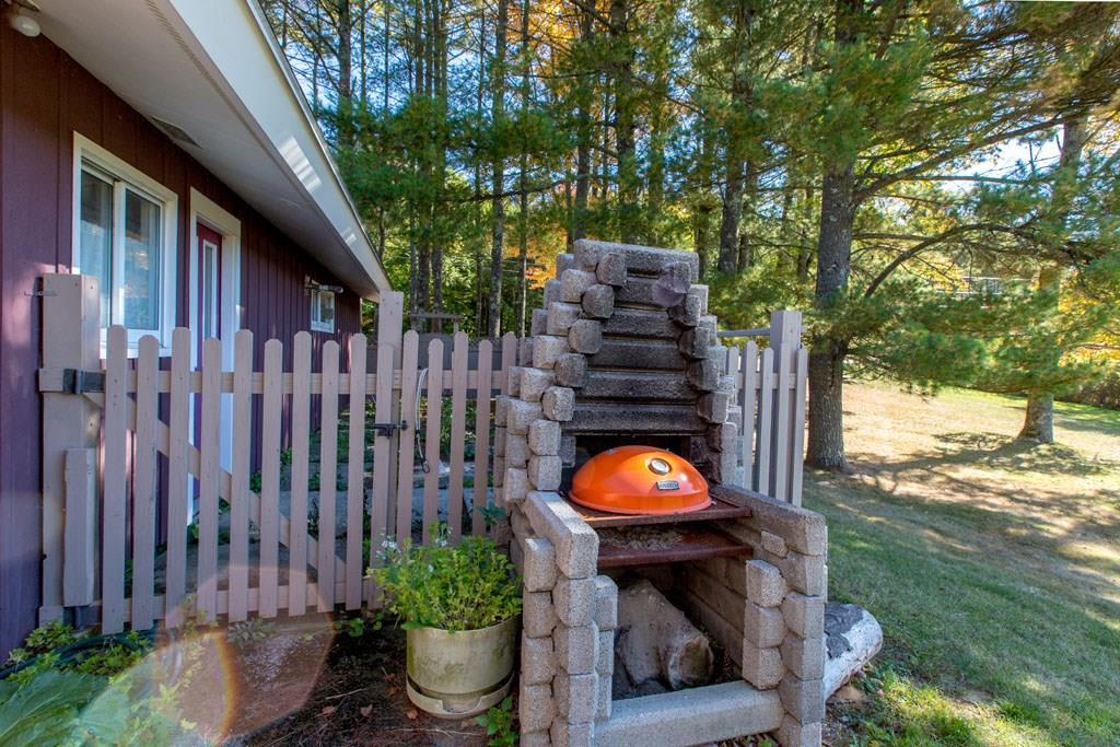 99 Pond Road Manchester, ME 04351 - Photo 29 of 33 Fenced outdoor patio space.
