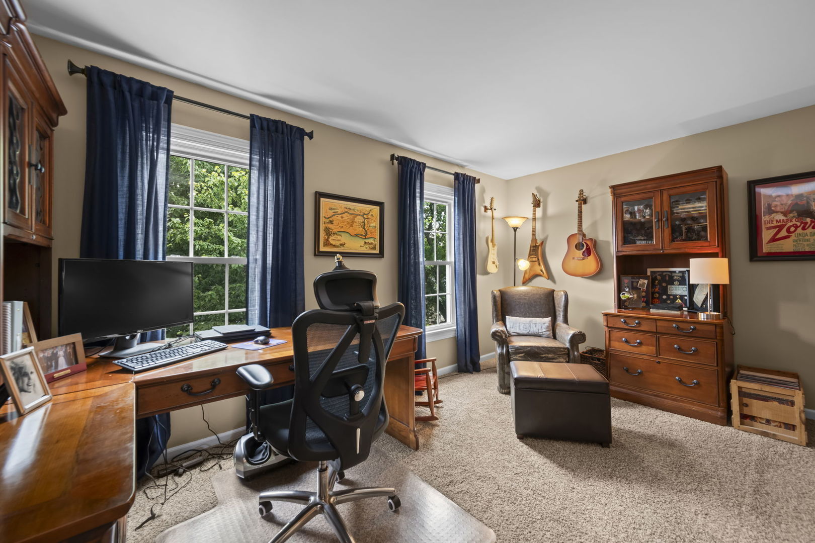 1565 Freeman Road Hoffman Estates, IL 60192 - Photo 33 of 46 a view of a workspace with furniture and a window