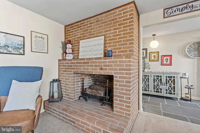 a view of a dining room and livingroom with furniture