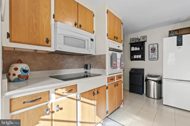 a bathroom with a sink a mirror and a toilet