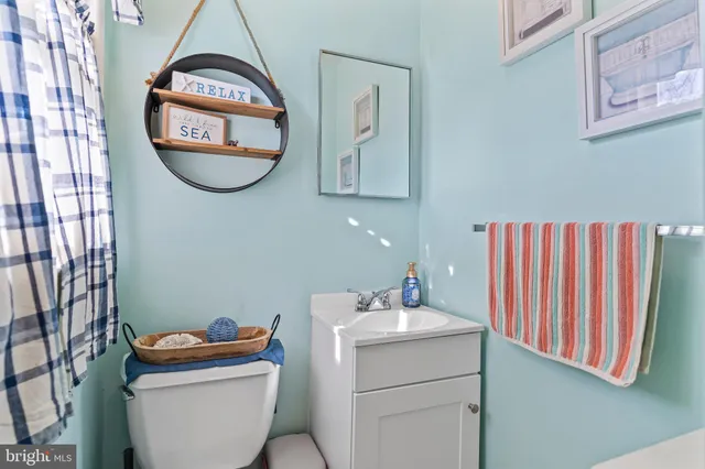 a kitchen with stainless steel appliances granite countertop a table and chairs