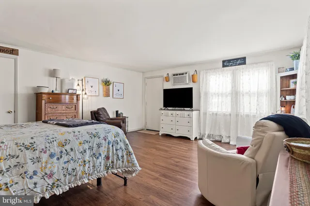 a bedroom with furniture and a couch