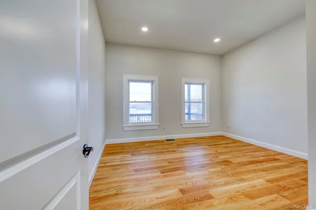 a view of an empty room and window