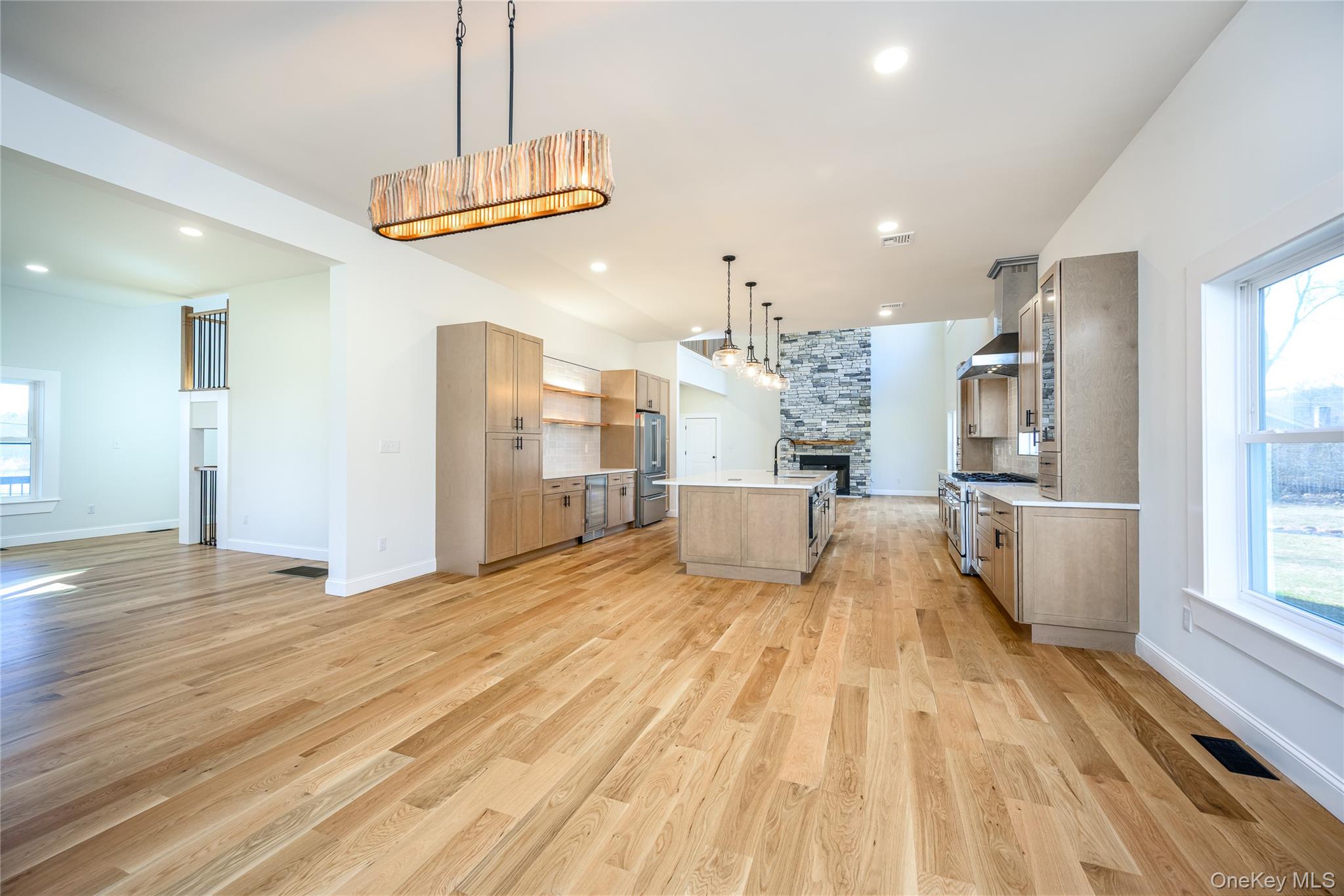 133 West Mombasha Road Monroe, NY 10950 - Photo 15 of 41 a view of a kitchen with wooden floor and a window