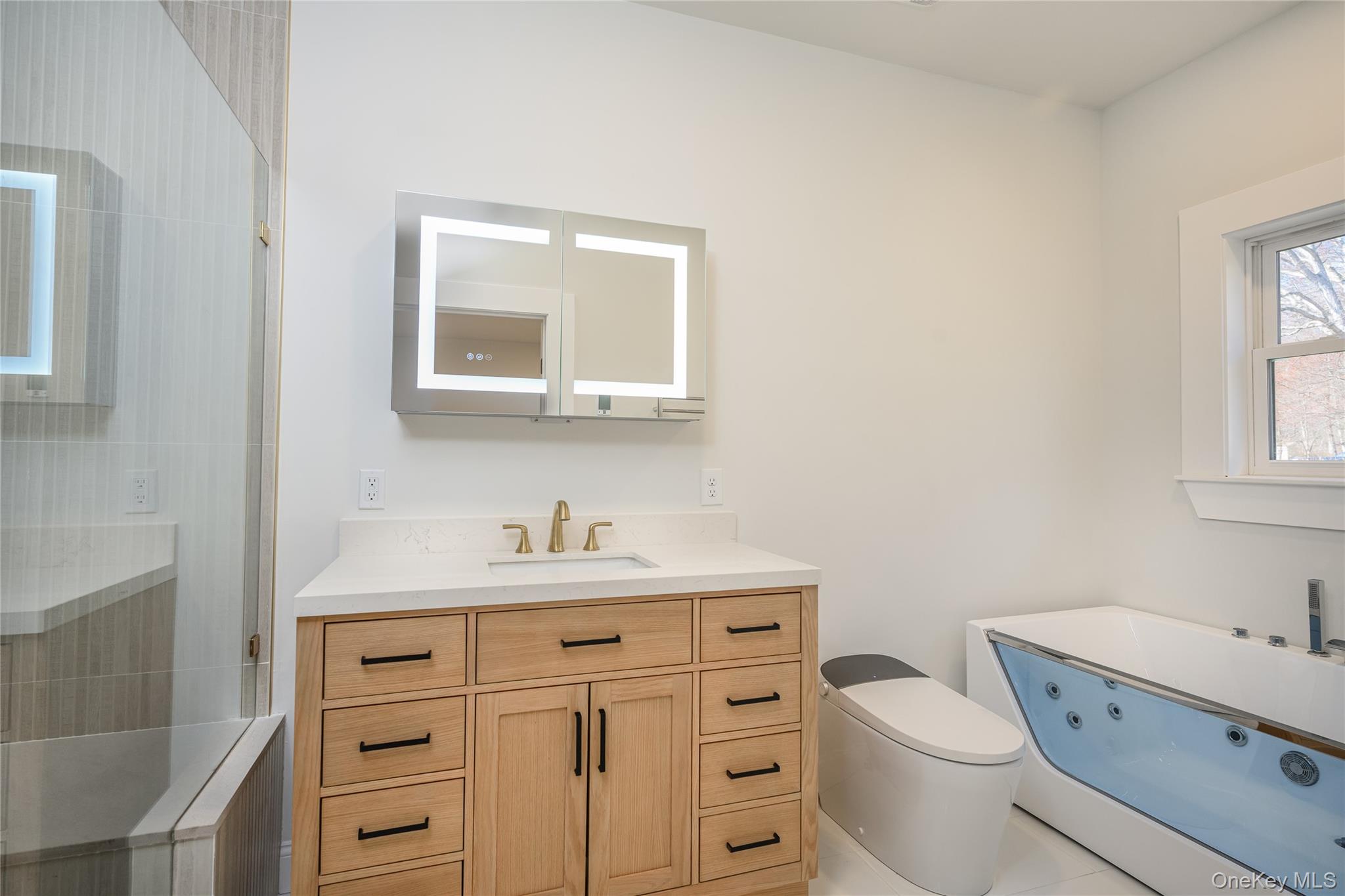 133 West Mombasha Road Monroe, NY 10950 - Photo 29 of 41 a bathroom with a toilet a sink a vanity and mirror