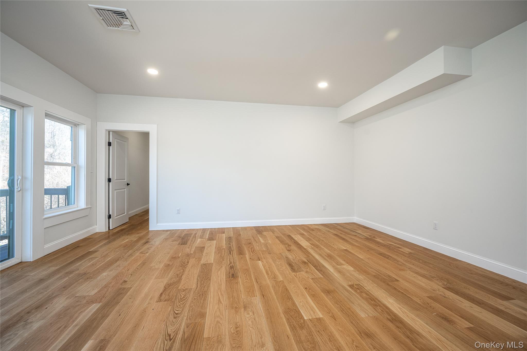 133 West Mombasha Road Monroe, NY 10950 - Photo 30 of 41 a view of empty room with wooden floor and fan
