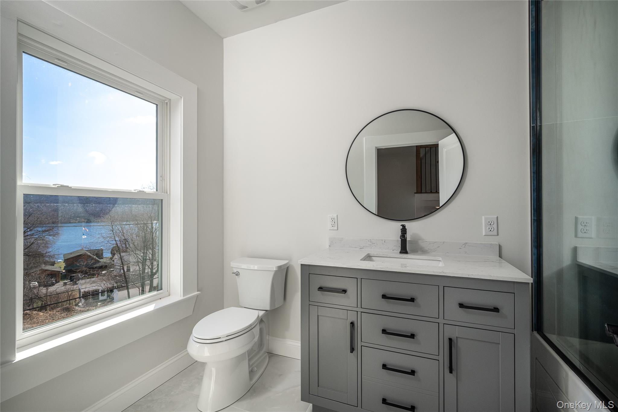 133 West Mombasha Road Monroe, NY 10950 - Photo 34 of 41 a bathroom with a toilet sink vanity and mirror