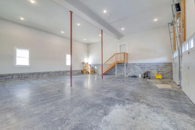 a view of a fireplace with wooden floor